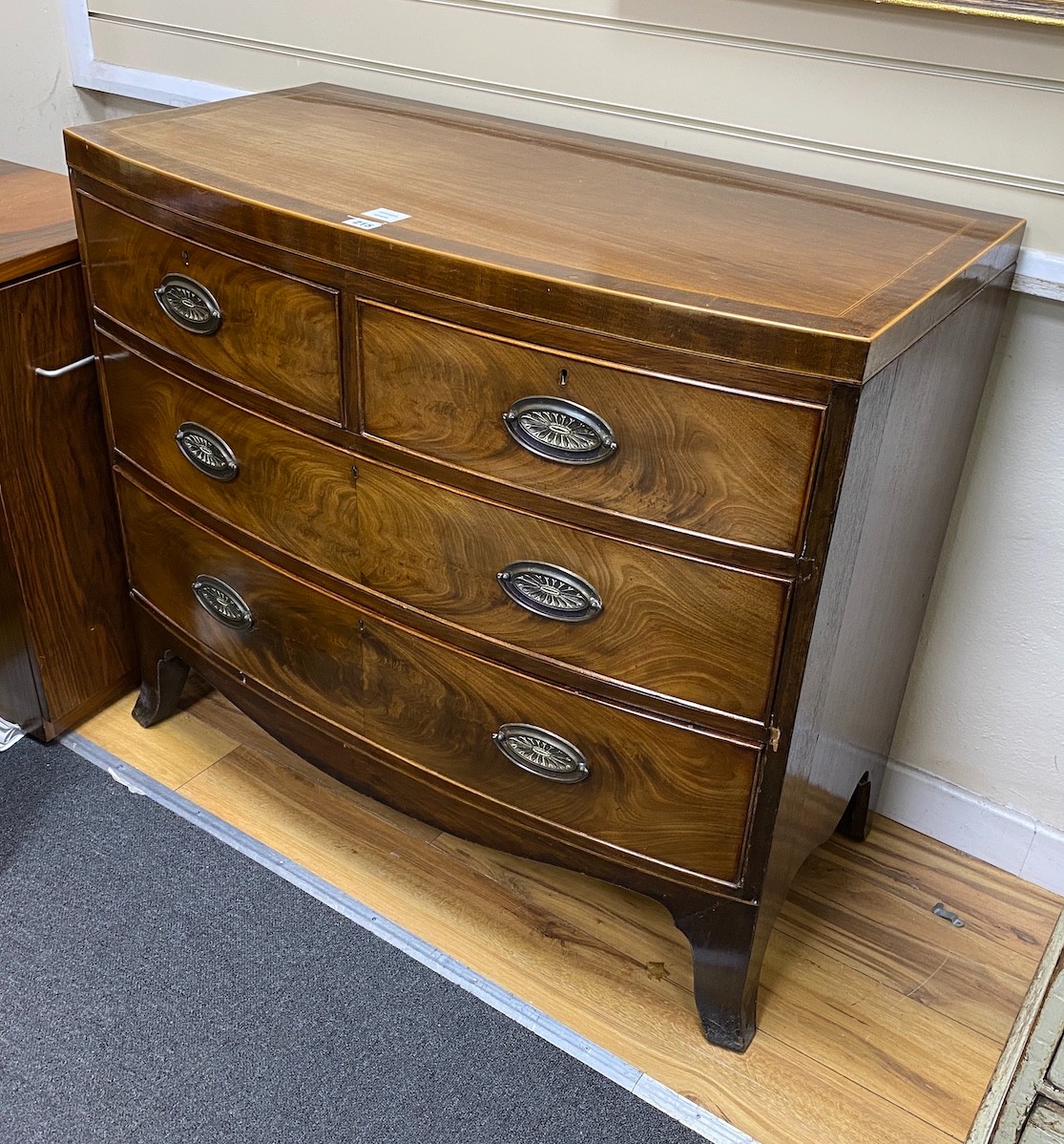 A Regency banded mahogany bow fronted chest of drawers, width 103cm, depth 52cm, height 89cm